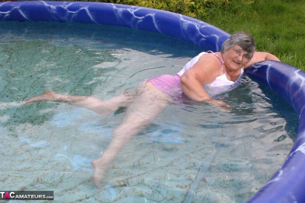 Overweight UK nan Grandma Libby exposes her boobs in a backyard swimming pool - #6