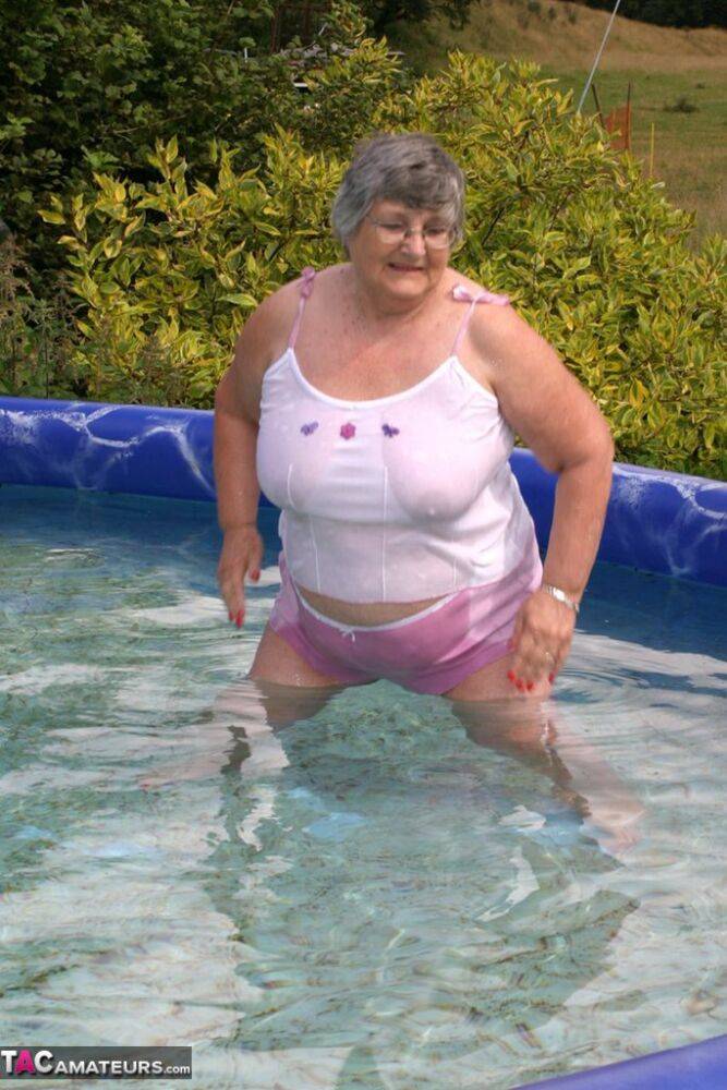 Overweight UK nan Grandma Libby exposes her boobs in a backyard swimming pool - #14