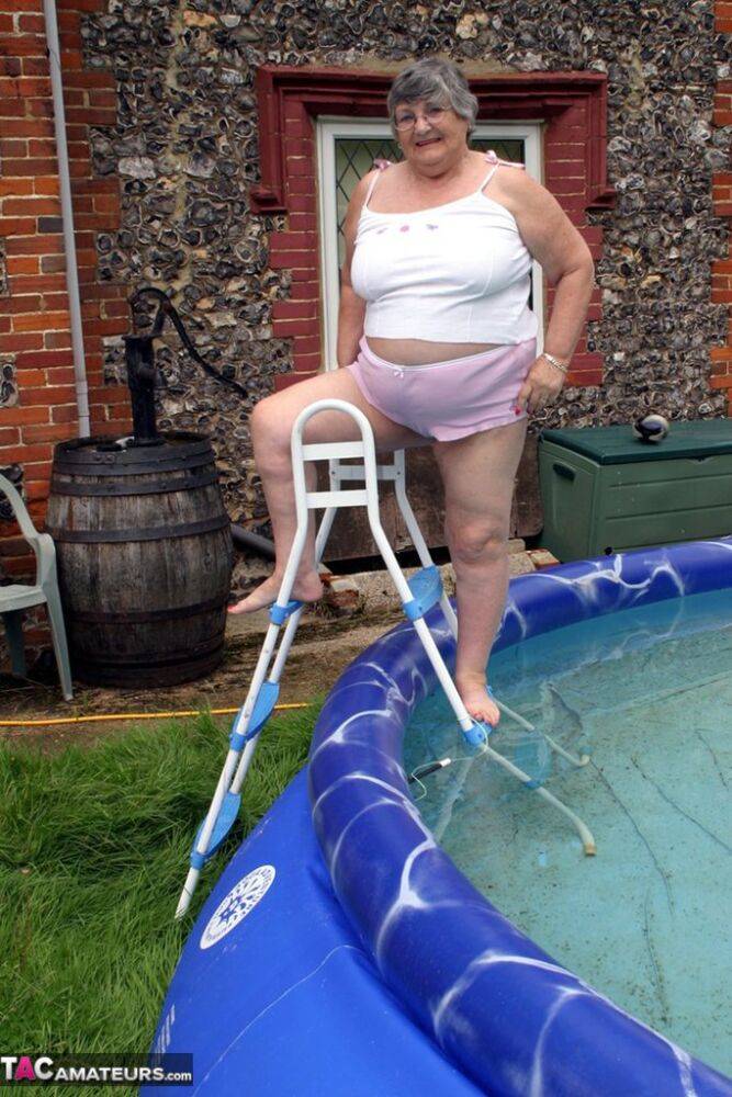 Overweight UK nan Grandma Libby exposes her boobs in a backyard swimming pool - #7