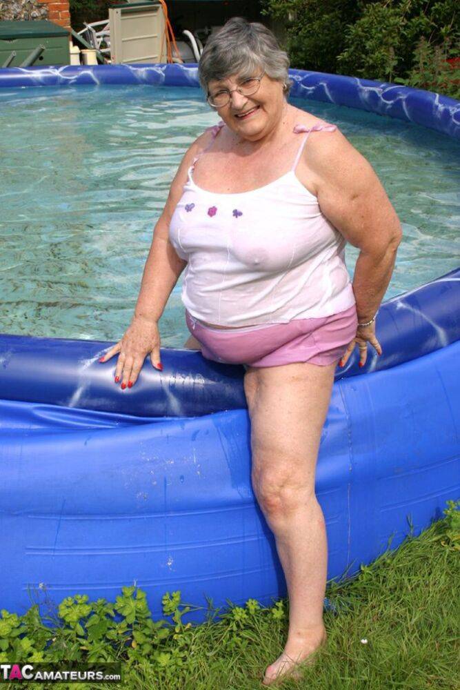 Overweight UK nan Grandma Libby exposes her boobs in a backyard swimming pool - #9