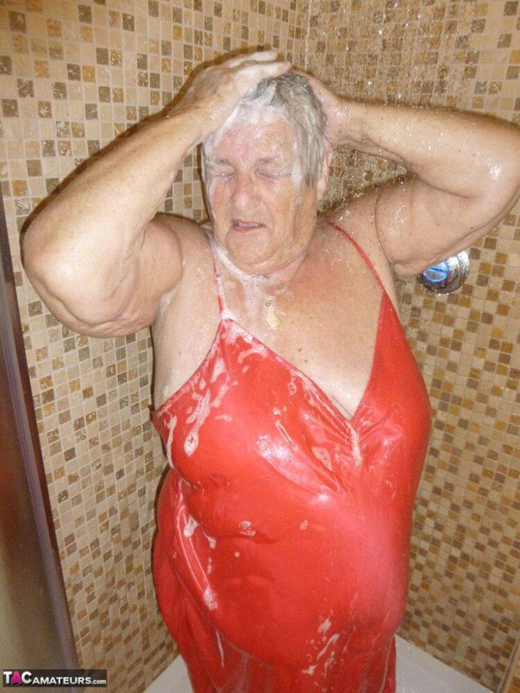 Fat old woman Grandma Libby blow dries her hair after showering - #5