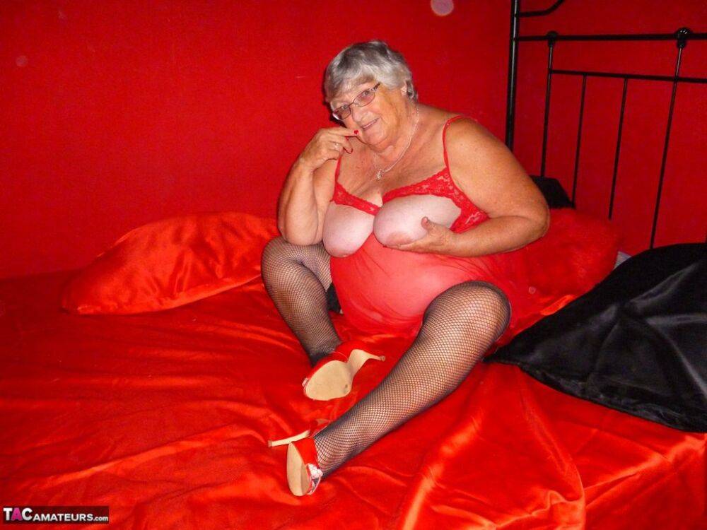 Obese nan Grandma Libby dildos her freshly shaved vagina on a bed - #1