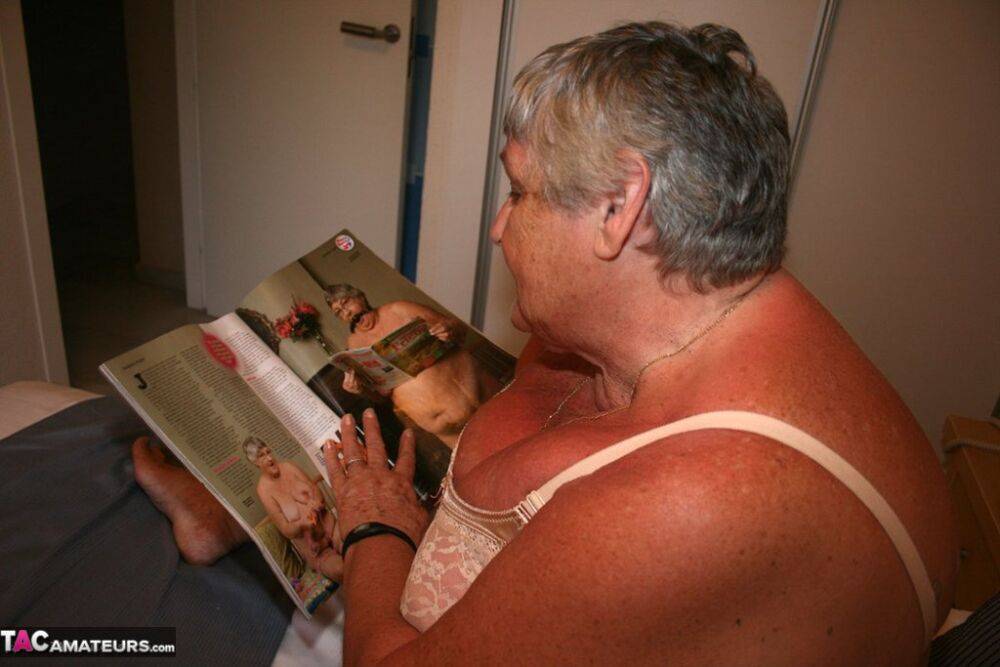 Fat British lady Grandma Libby masturbates while perusing a girly magazine - #1