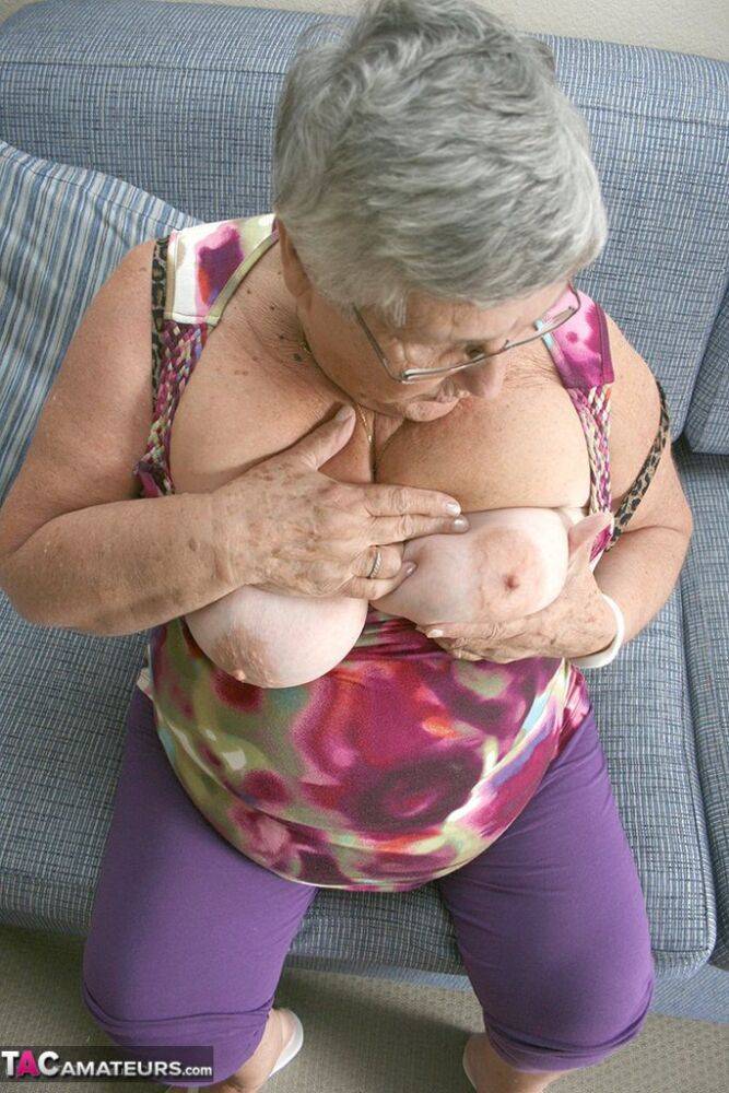 Huge fatty granny baring her saggy boobs & spreading her horny pussy wide open - #2
