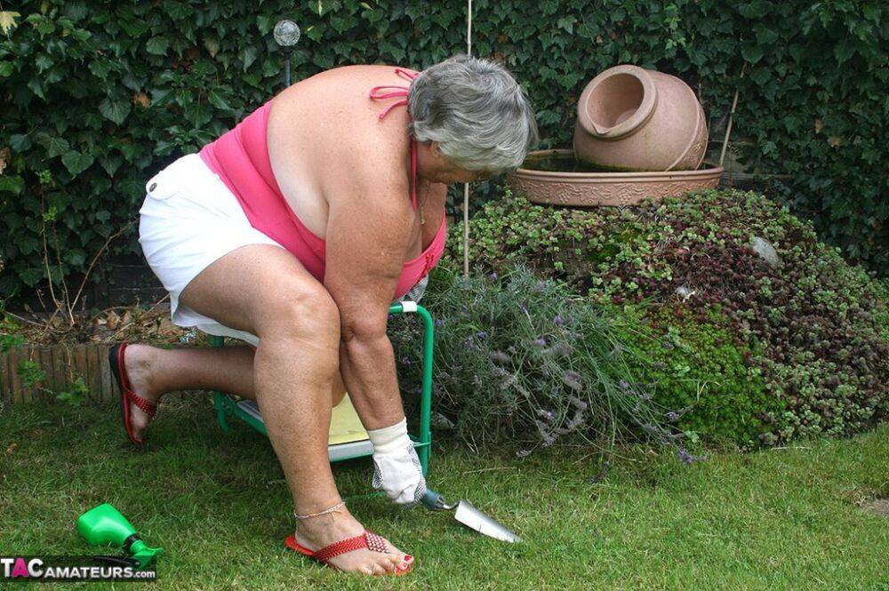 Fat nan Grandma Libby bares her huge ass before licking a nipple in her yard - #16