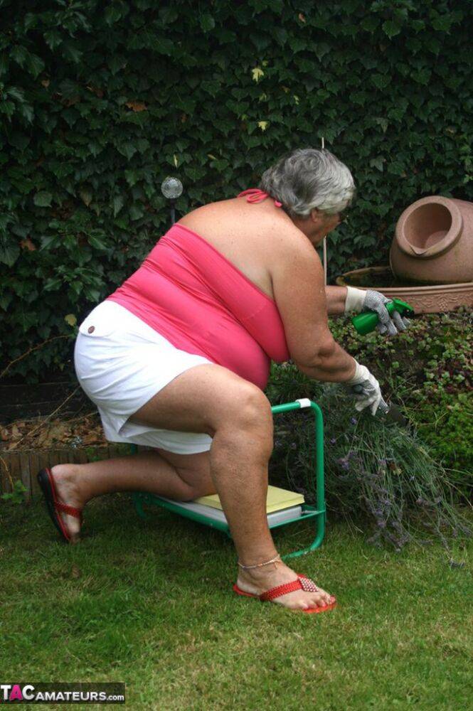 Fat nan Grandma Libby bares her huge ass before licking a nipple in her yard - #7