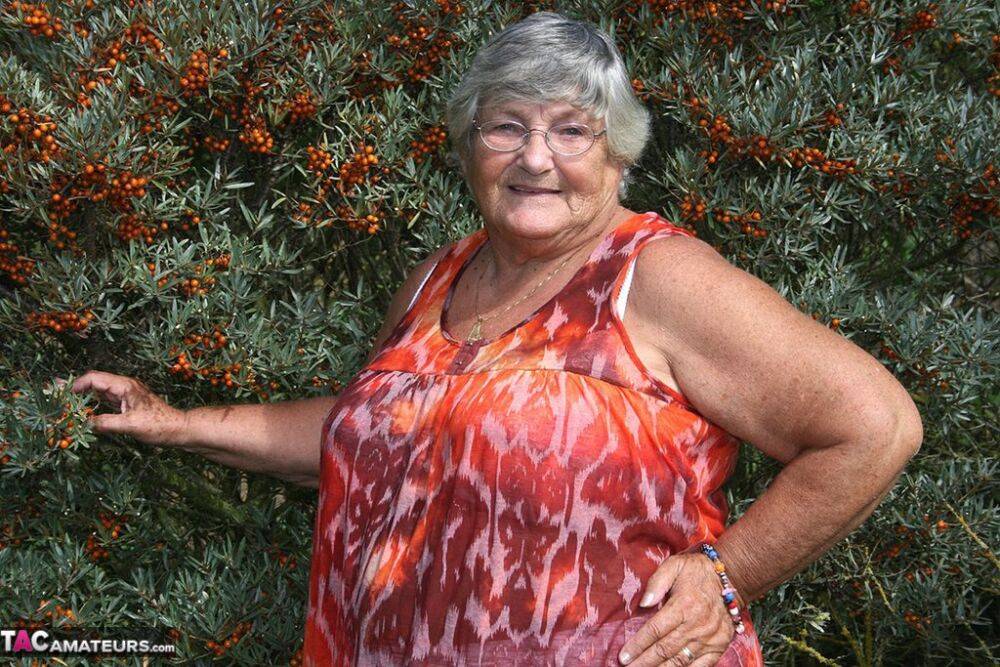 Obese nan Grandma Libby strips totally naked out by evergreen trees - #3