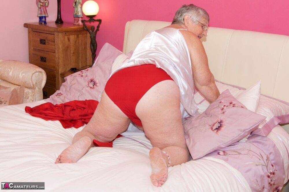 Obese nan Grandma Libby toys her pussy on the bed with her glasses on - #15