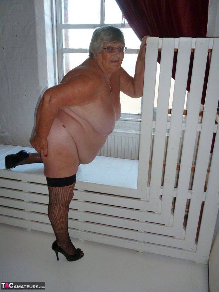 Fat nan Grandma Libby takes off a black dress to model naked in stockings - #3