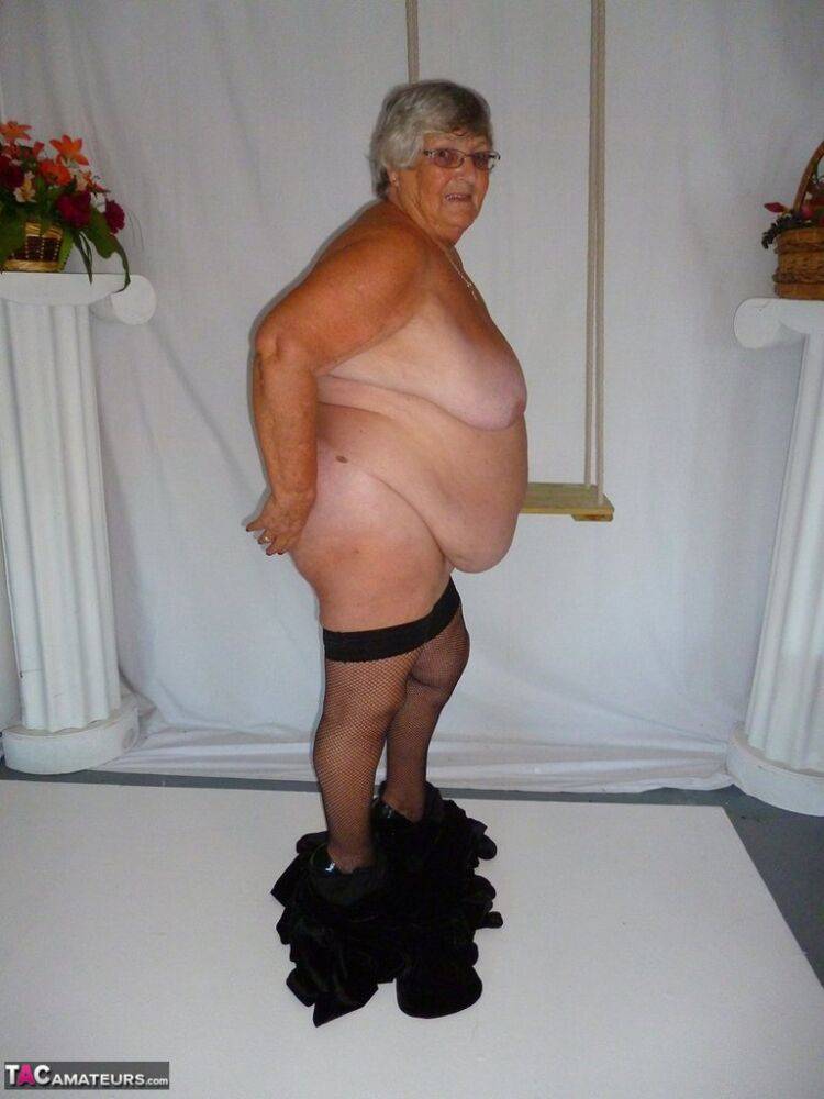 Fat nan Grandma Libby takes off a black dress to model naked in stockings - #6