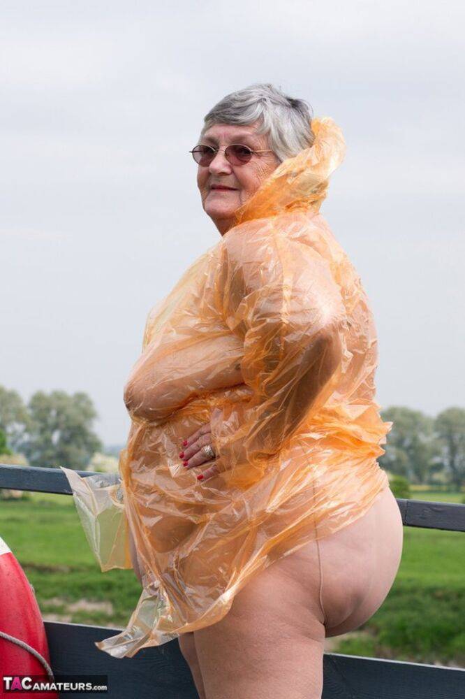 Obese oma Grandma Libby doffs a see-through raincoat to get naked on a bridge - #5