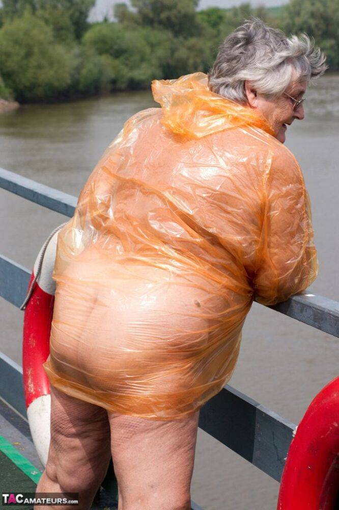 Obese oma Grandma Libby doffs a see-through raincoat to get naked on a bridge - #14