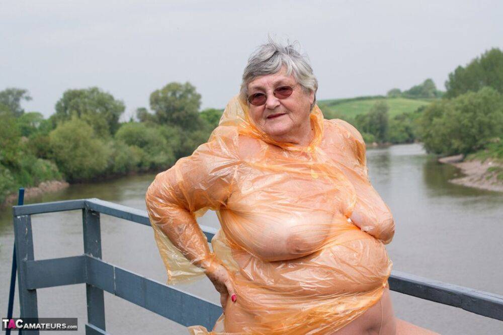 Obese oma Grandma Libby doffs a see-through raincoat to get naked on a bridge - #8