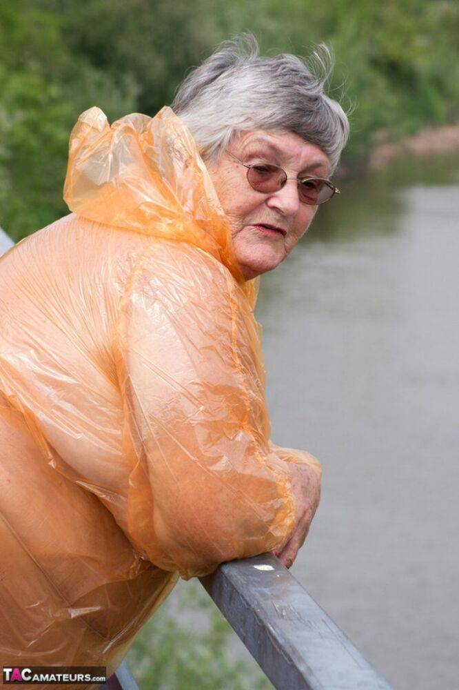 Obese oma Grandma Libby doffs a see-through raincoat to get naked on a bridge - #6