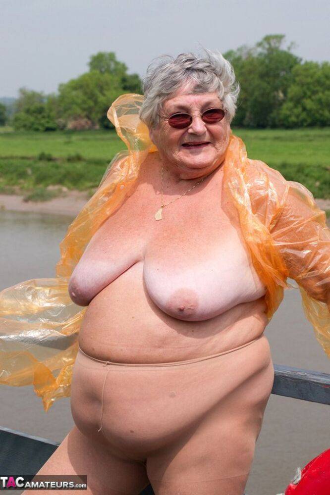 Obese British amateur Grandma Libby casts off a see-through raincoat - #15