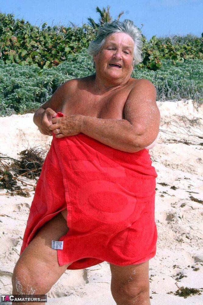 Obese nan Grandma Libby gets wet and naked while spending the day at a beach - #9