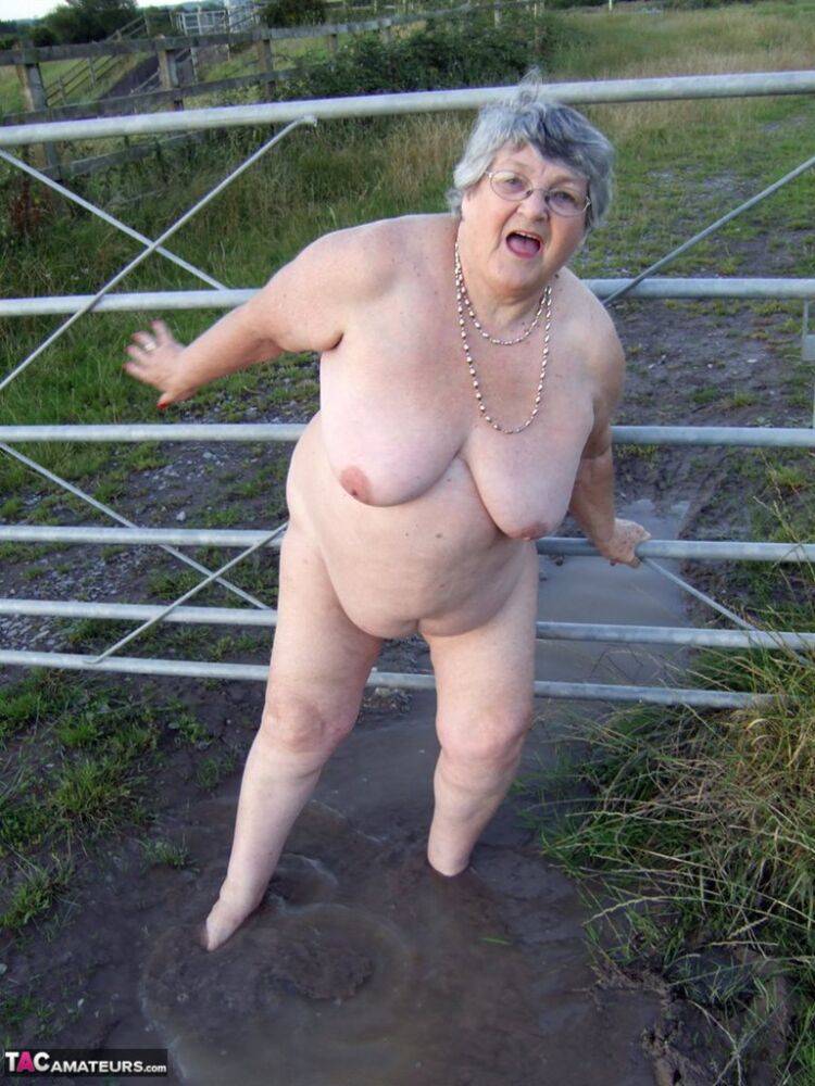 Fat nan Grandma Libby steps into a puddle before covering herself in mud - #11