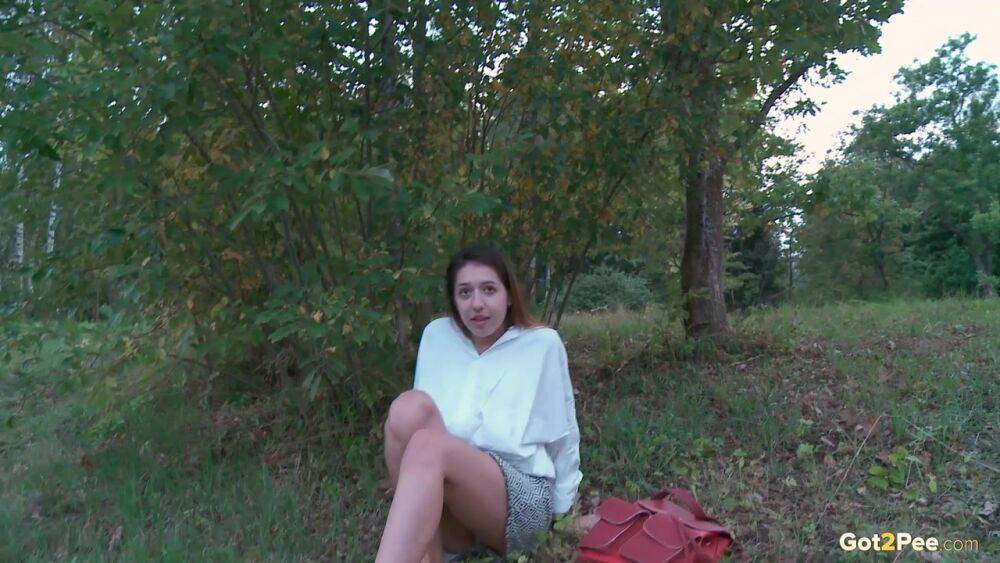 Brunette cutie squats to piss near the lake - #15