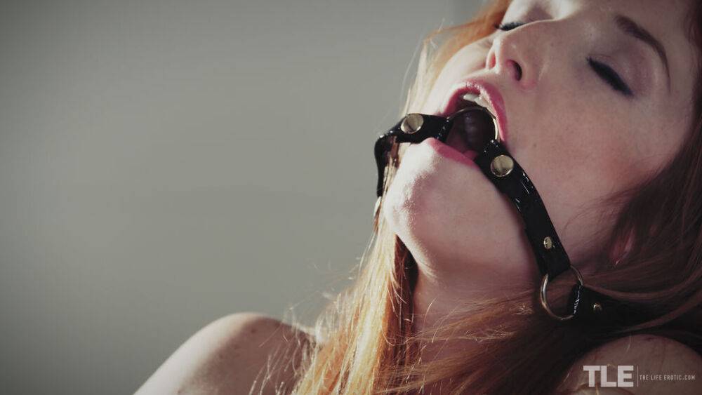 Michelle H topless in black pantyhose, she straps an O ring gag into her mouth - #3