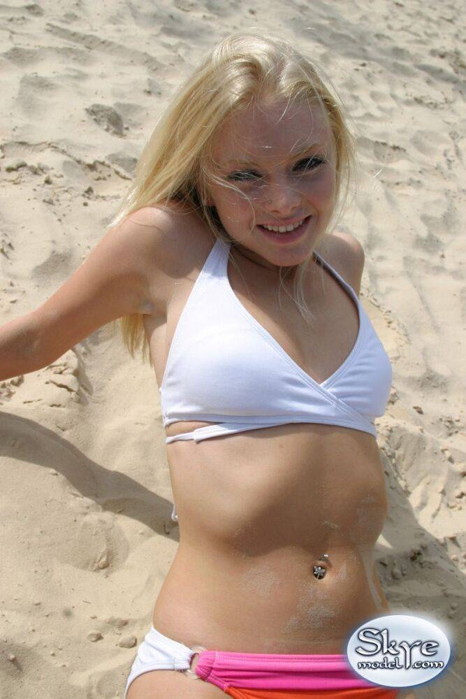 Petite teen Skye Model wearing sexy white bikini and flip flops on the beach - #8