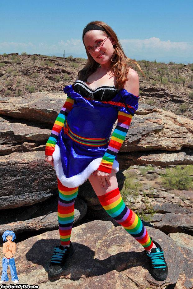 White teen Bunny strips to multi-colored arm and legs socks on an outcrop - #2