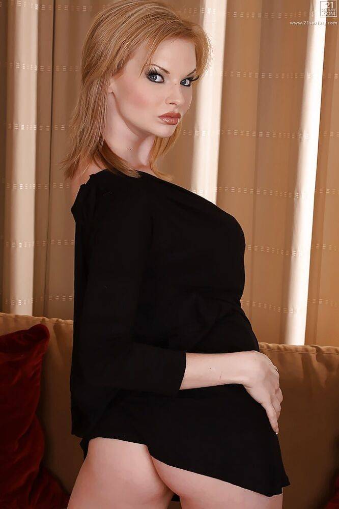 Beautiful blonde teener Tarra White posing fully clothed in black dress - #2