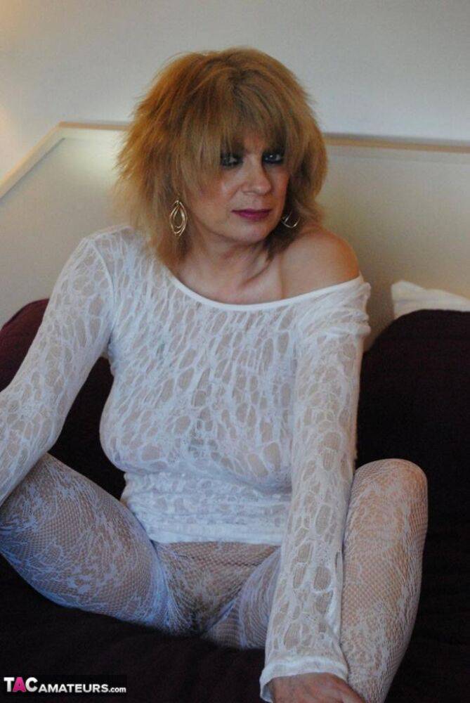 Hot mature Dimonty lounges with legs spread in sheer white lace lingerie - #2