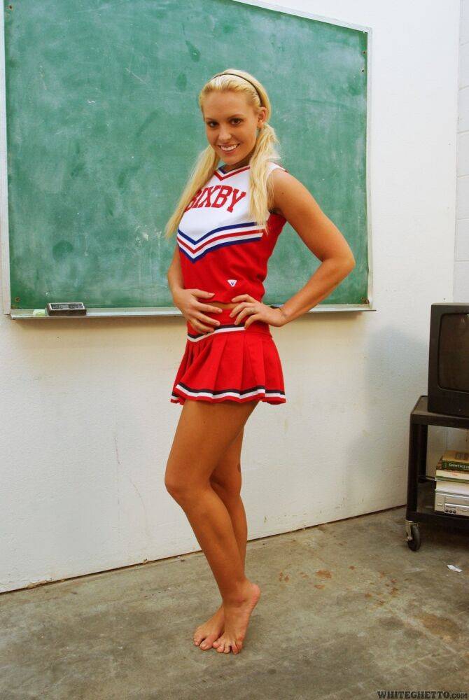 Blonde babe Jamey James flashing upskirt panties in cheerleader uniform - #15