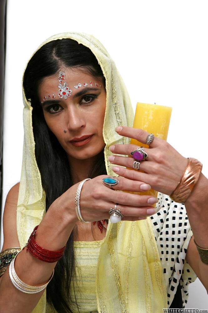 Indian solo model Tamara setting up candles for worship wit her clothes on - #14