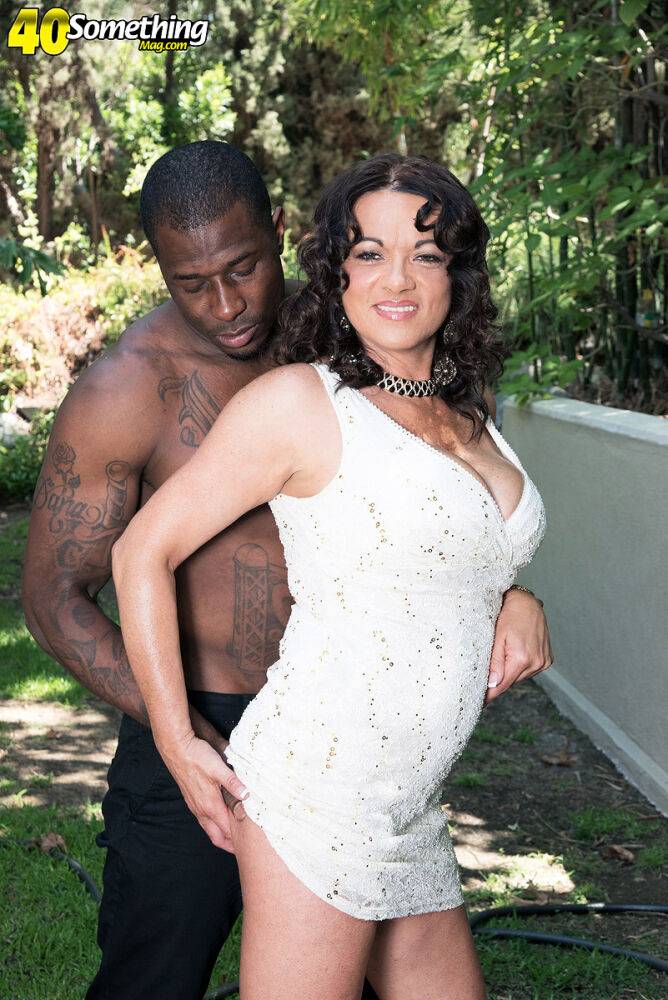 Busty cougar Betty Boobs seduces a hunky black stud in a white dress - #3