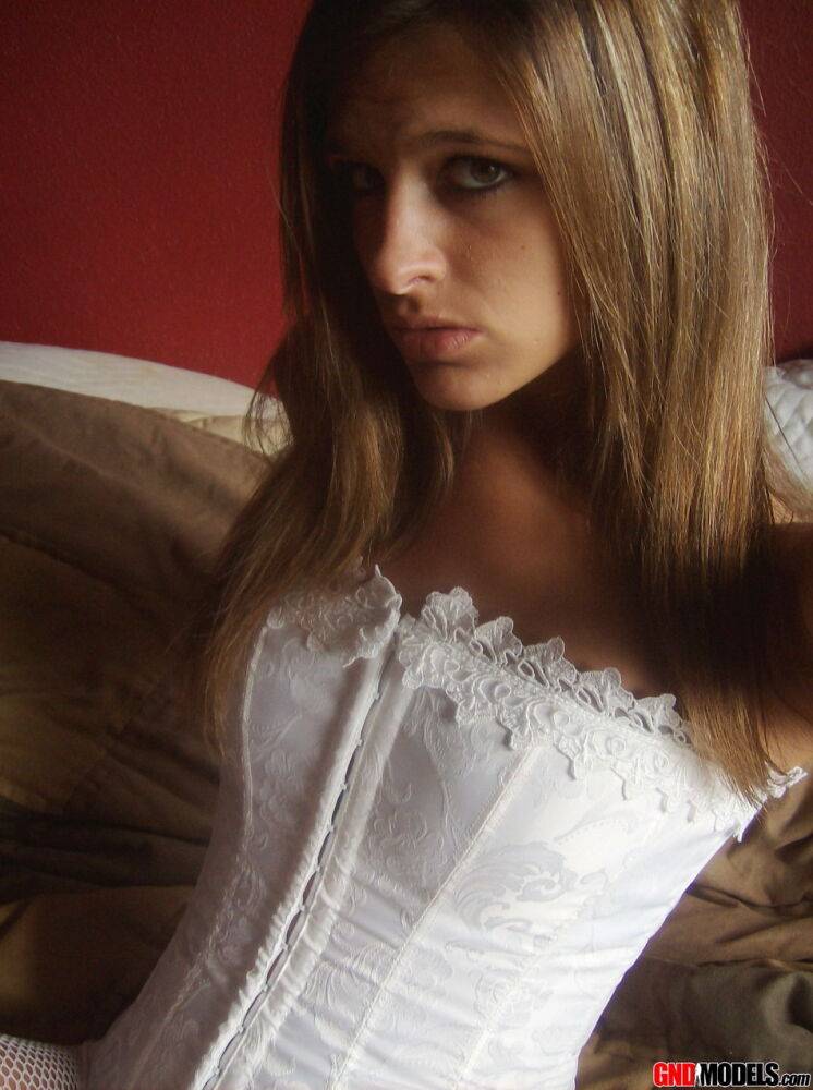 Teen in white corset and tight panties showing off her perfect tight body - #7