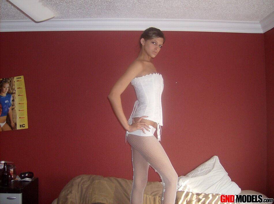 Teen in white corset and tight panties showing off her perfect tight body - #2