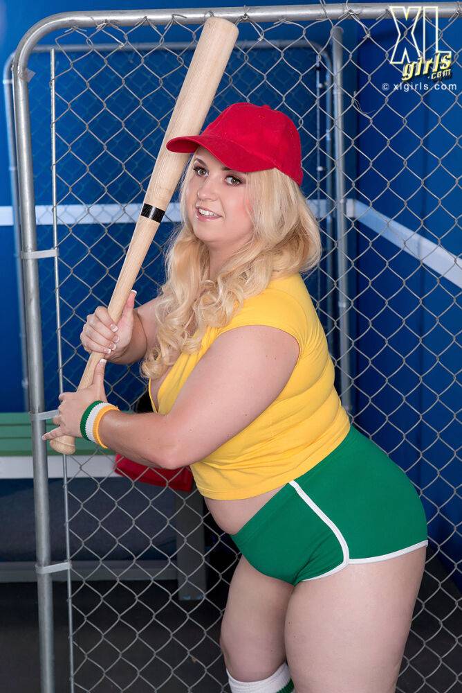 Blonde BBW Nikky Wilder strips to white socks and shoes in a batting cage - #2