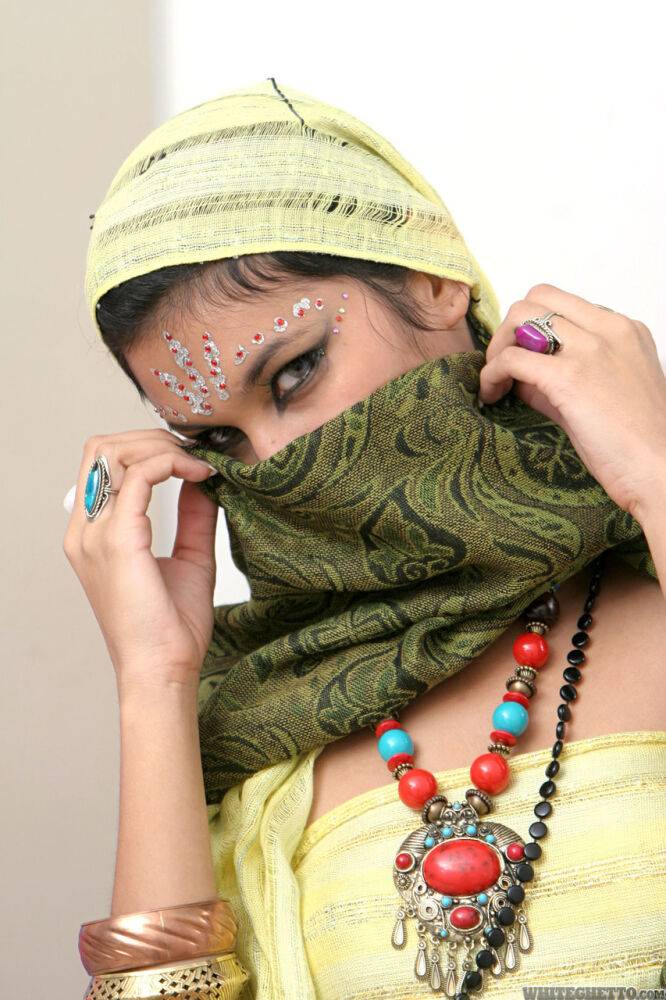 Fully clothed Indian female Yesica uncovering her forbidden face - #3