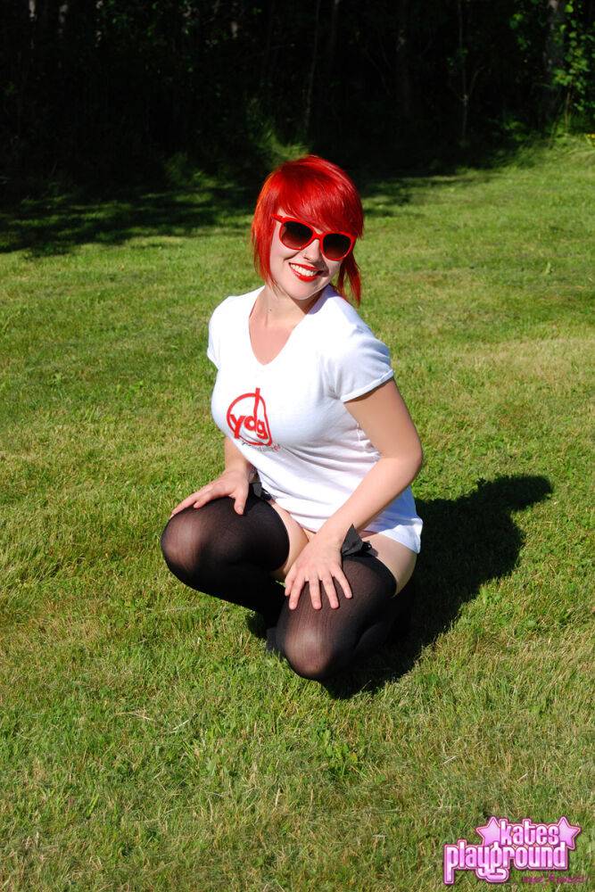 Redheaded amateur Sabrina soaks her white T-shirt out on a lawn in sunglasses - #2