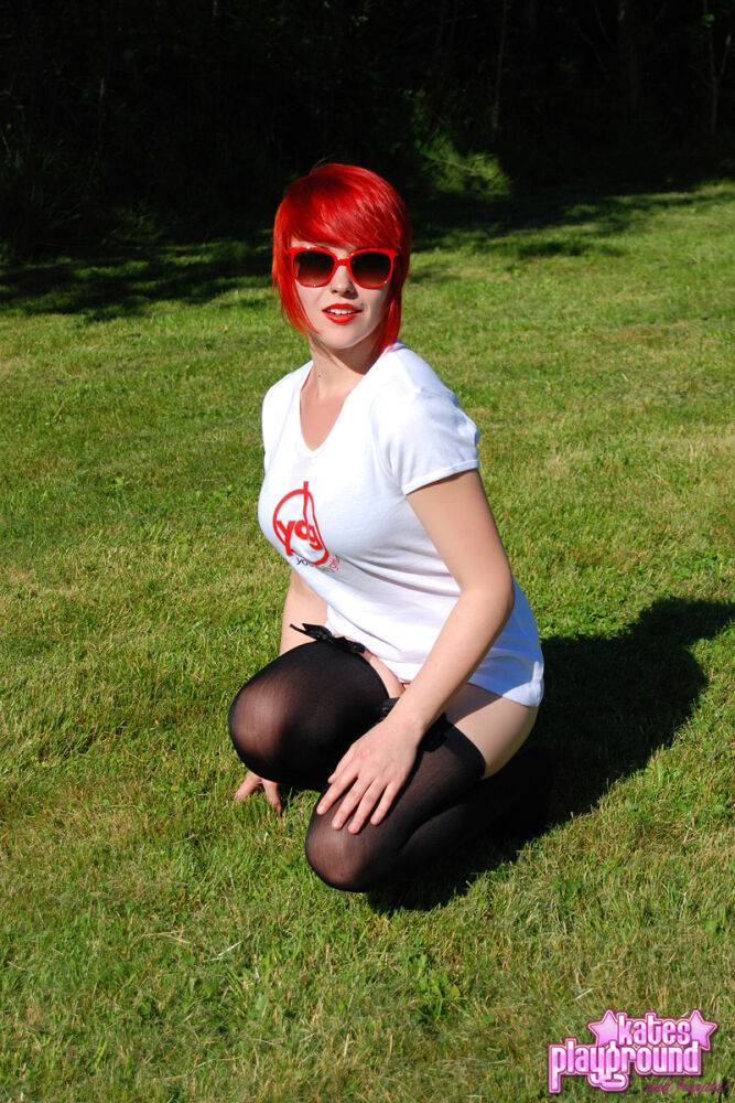 Redheaded amateur Sabrina soaks her white T-shirt out on a lawn in sunglasses - #3