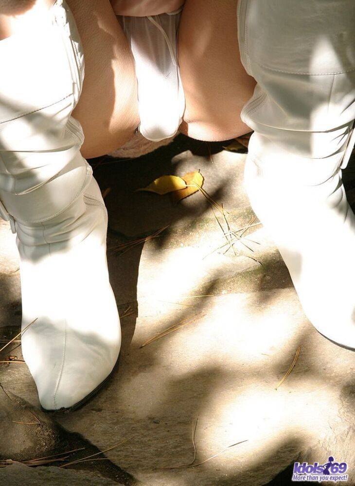 Japanese model Nana exposes her tits and bush in white latex boots - #1