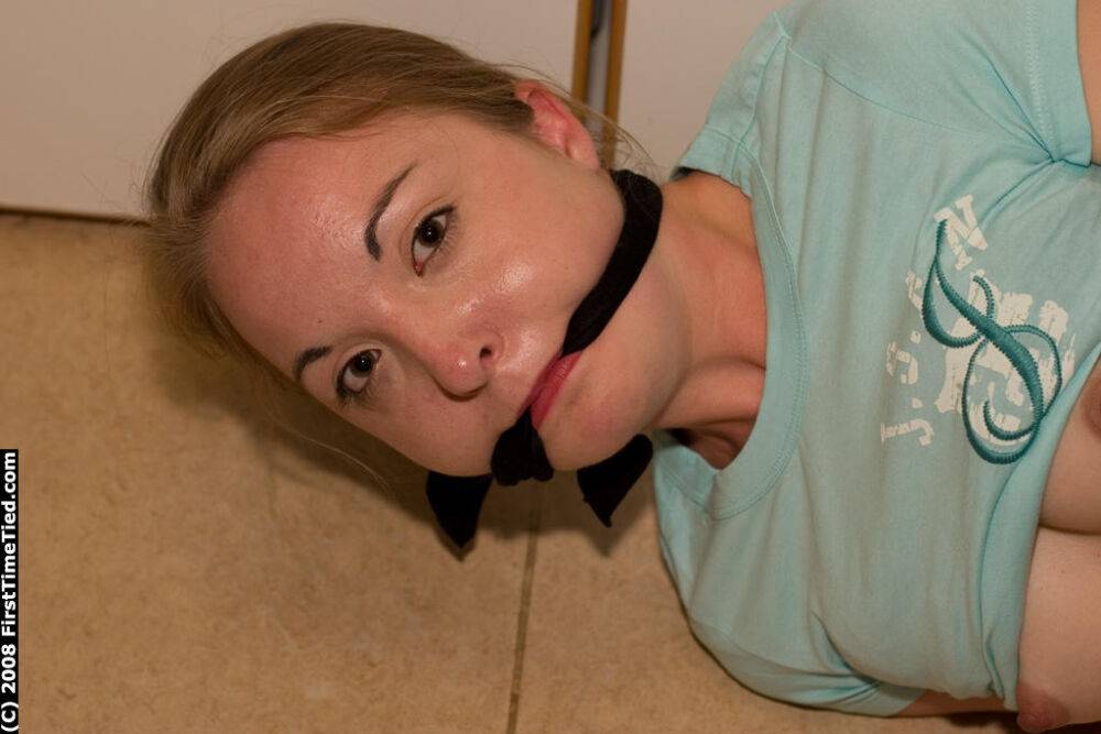 White girl is tied up and cuffed while ball gagged with pants pulled down - #12