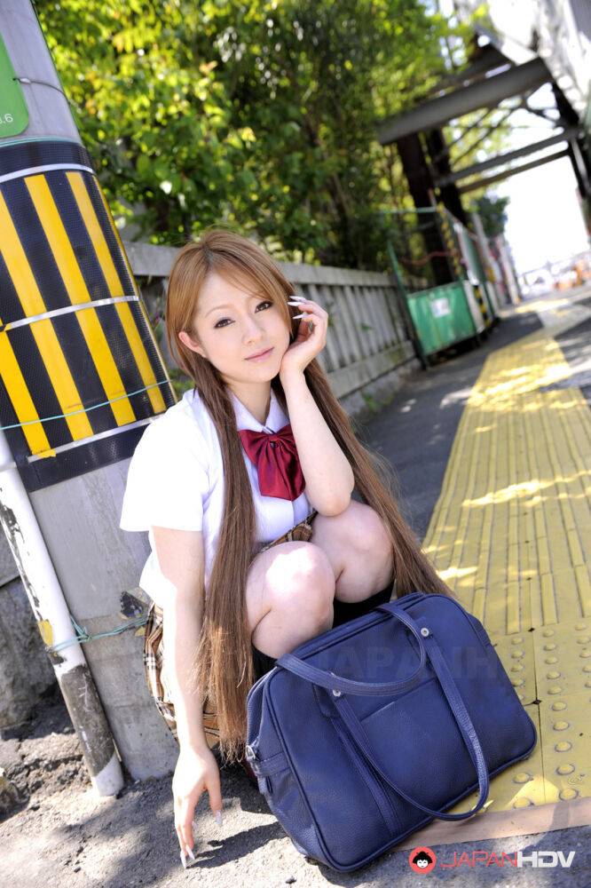 Innocent Japanese schoolgirl Ria Sakurai flashes sexy white panties in public - #8