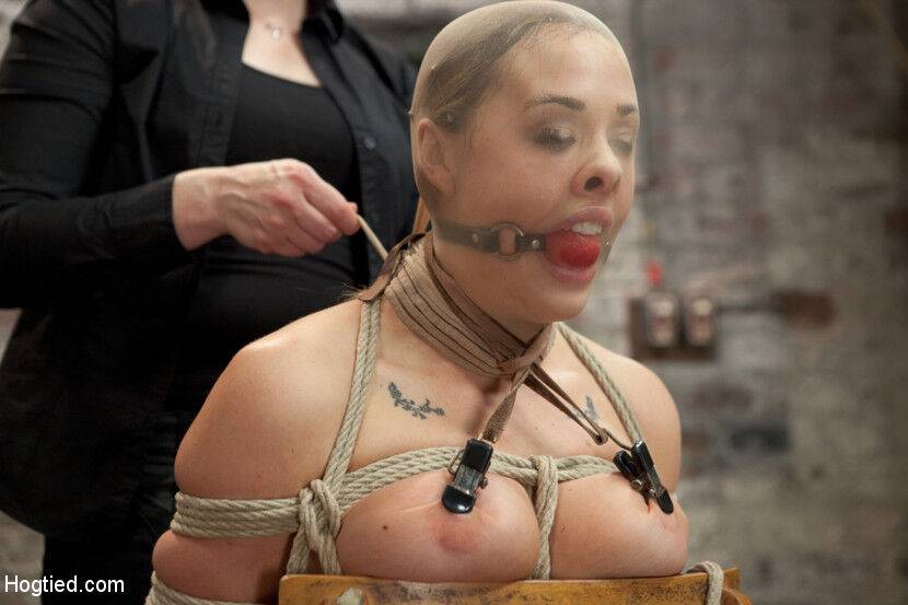 White girl is tied up with ropes while sporting a red ball gag - #11