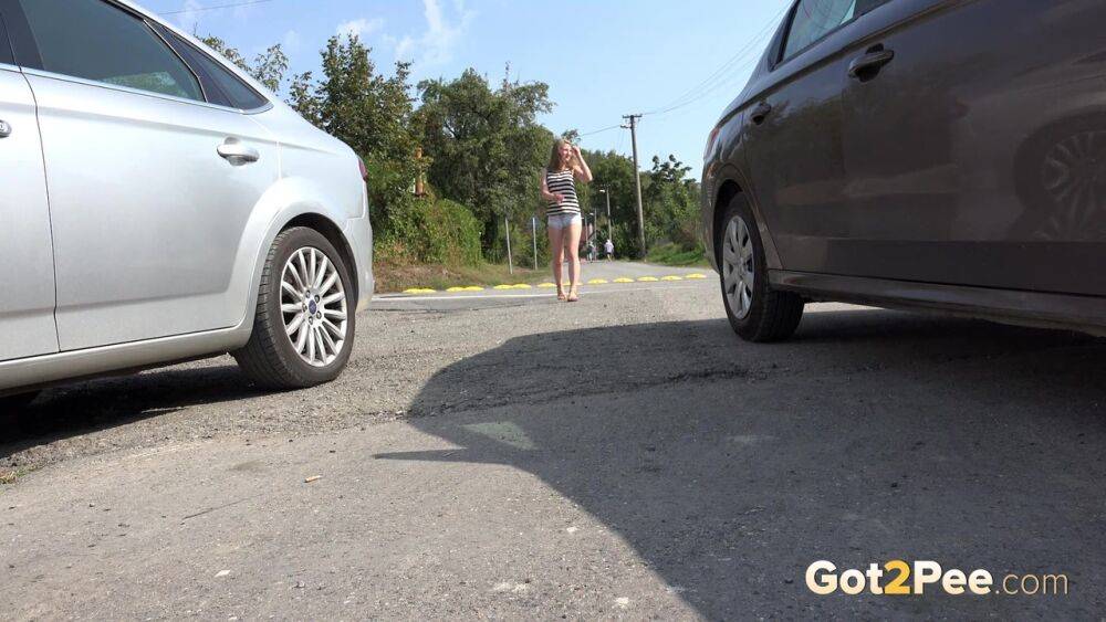 White girl Lolita pulls down her shorts for a quick pee between parked cars - #8