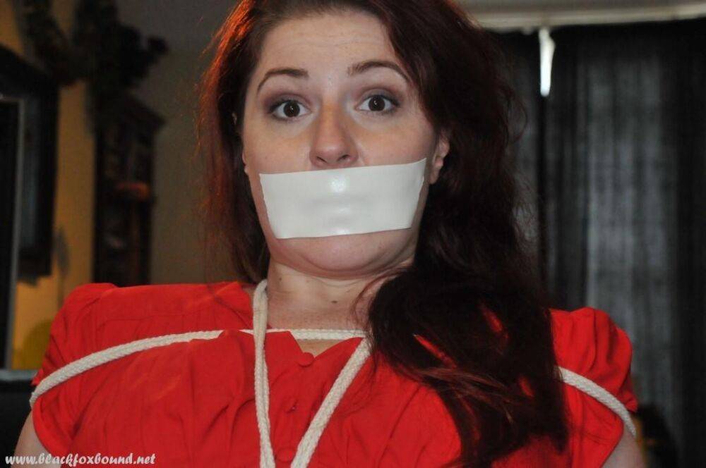 White girl is silenced with medical tape while tied up in her clothing - #13