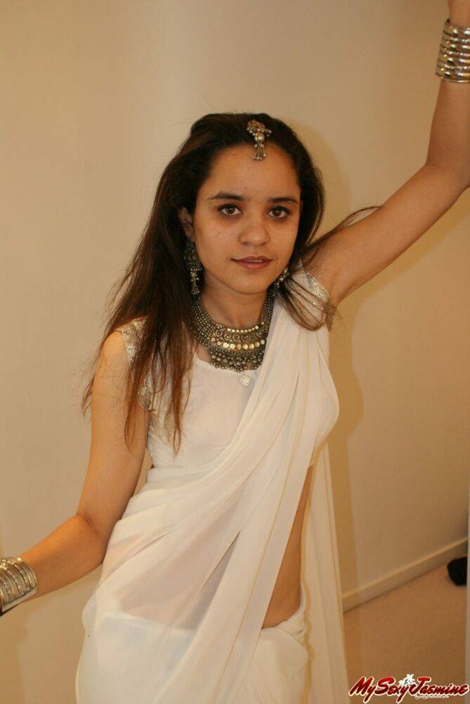 Jasmine in white indian saree looking hot teasing her man - #5