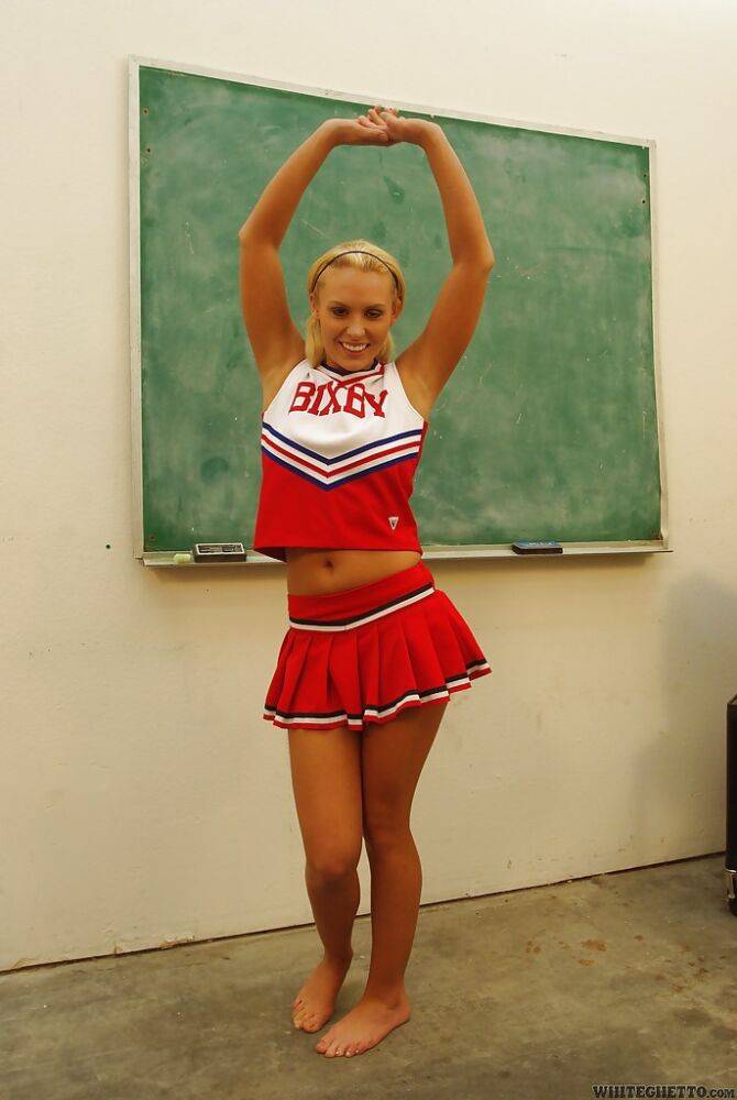 Nasty cheerleader Jamey James stripping and exposing her bare feet - #15