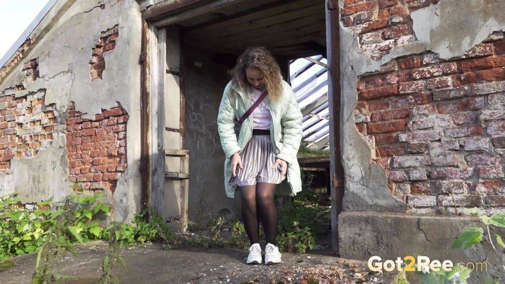 White girl Rita takes a piss by an abandoned building while taking a shortcut - #9