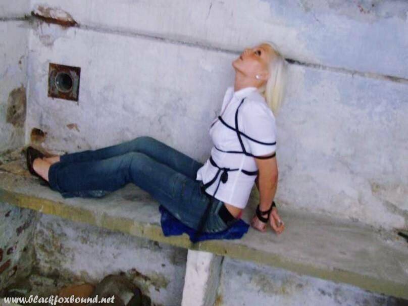 British woman is tied up and gagged in blue jeans and a white shirt - #11