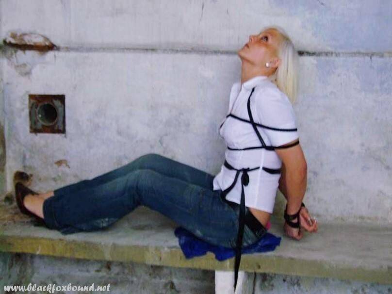 British woman is tied up and gagged in blue jeans and a white shirt - #12