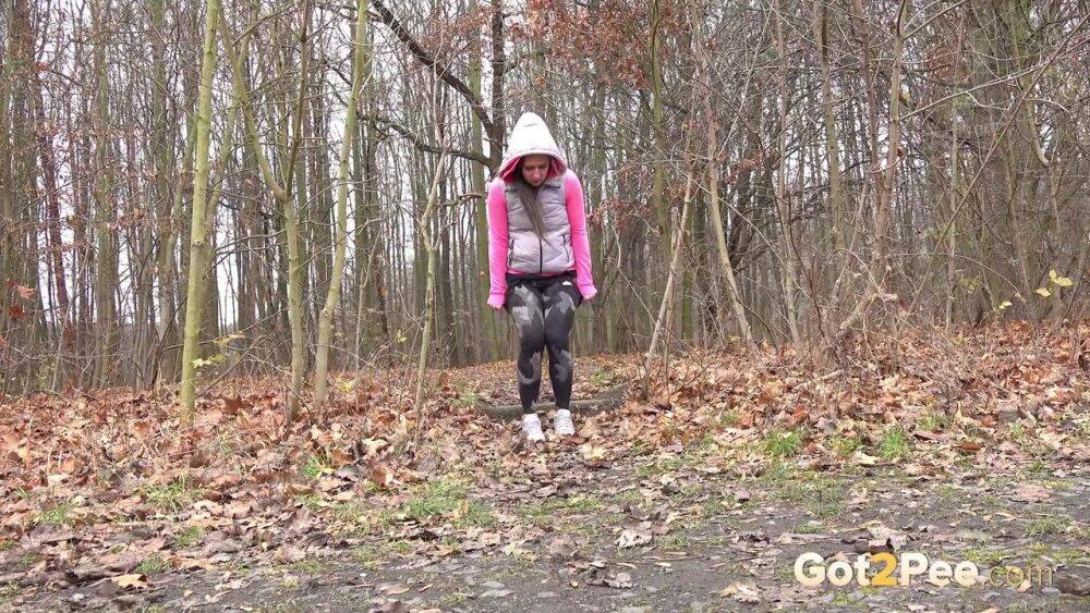 White girl Lara Fox takes a piss while out for a walk on a chilly day - #14
