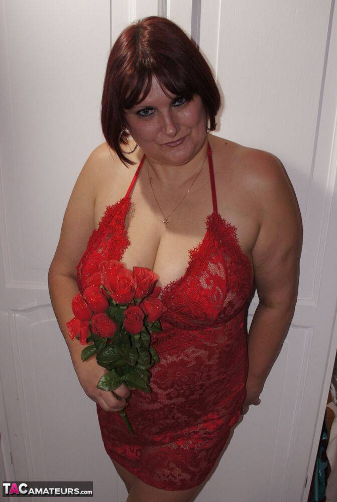 Busty mature lady holds roses while being joined by topless girlfriends - #3