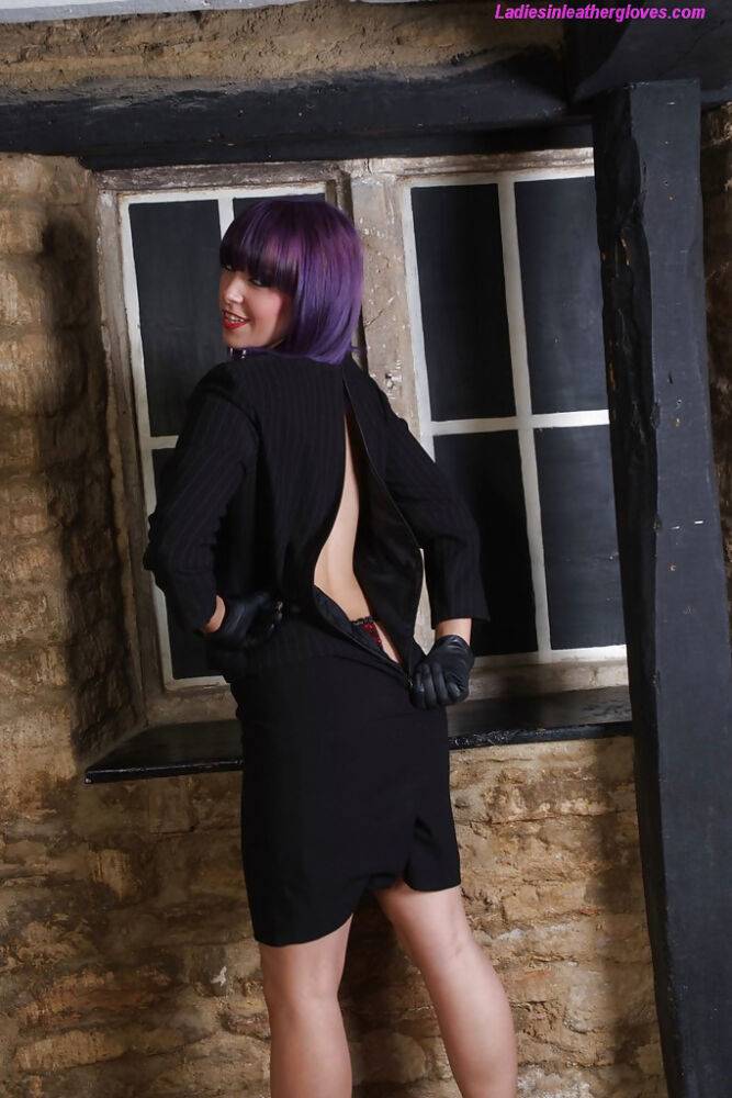 Pretty chick with purple hair poses fully clothed in black dress and pumps - #15